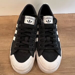 Adidas women’s Black and White Sneakers